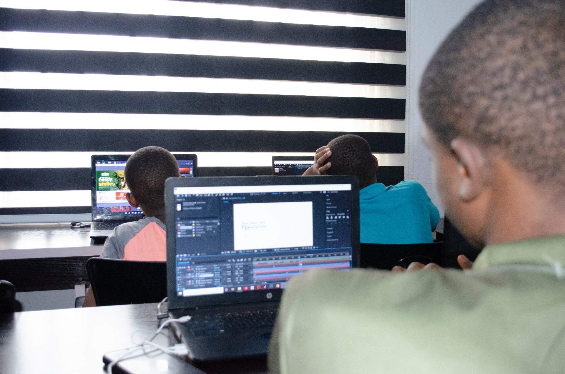 Students in a real Keltalz training session using laptops in class